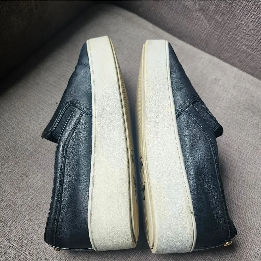 Michael Kors black and gold star slip on shoes. Sz 7